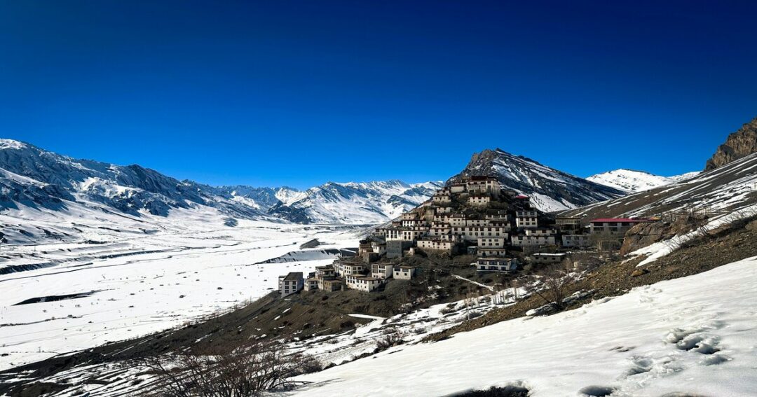 Snow-covered Himalayan village in winter | ALT TEXT: top 10 coldest places in India Himalayan village winter]