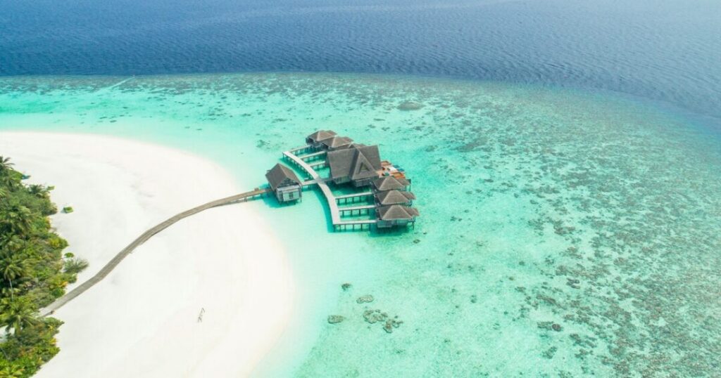 Maldives atoll aerial view Indian Ocean