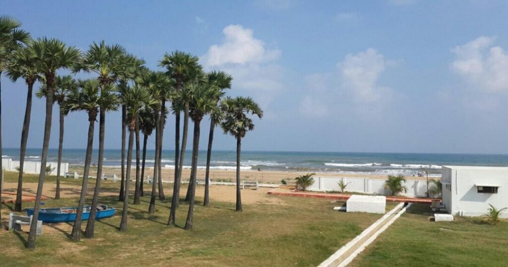 Family enjoying landscaped gardens and shoreline at Mypadu Beach Nellore